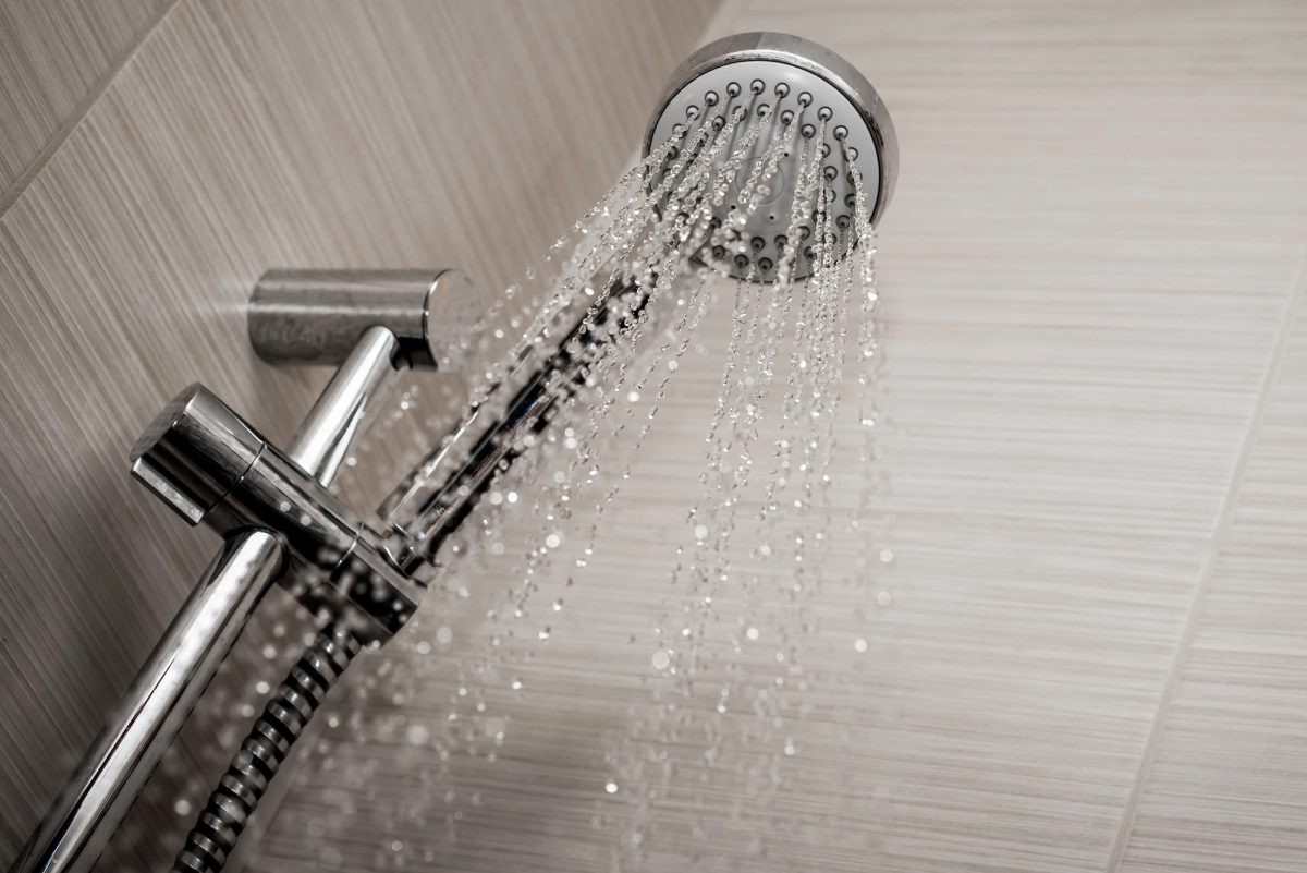 Hot water flowing from a shower head