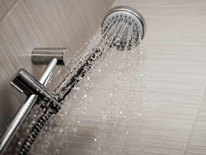 Hot water flowing from a shower head