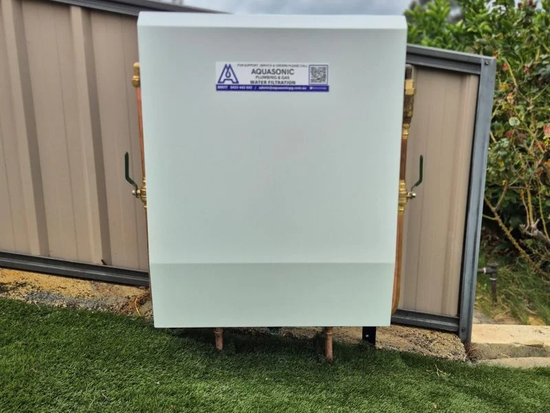 Aquasonic whole-house water filtration unit installed outside a home in Mandurah